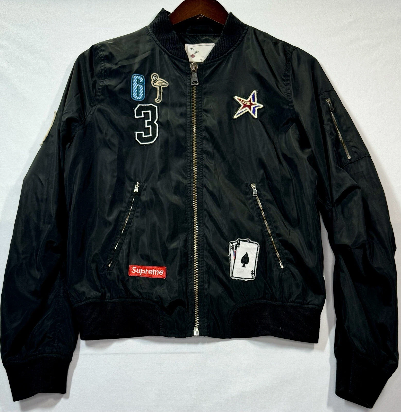 Blouson bomber noir It Girl patchs décoratifs écusson suprême et doublure taille M