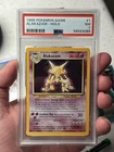 Alakazam 1/102 1999 Pokemon Base Set Unlimited Holo Card PSA 7 NM