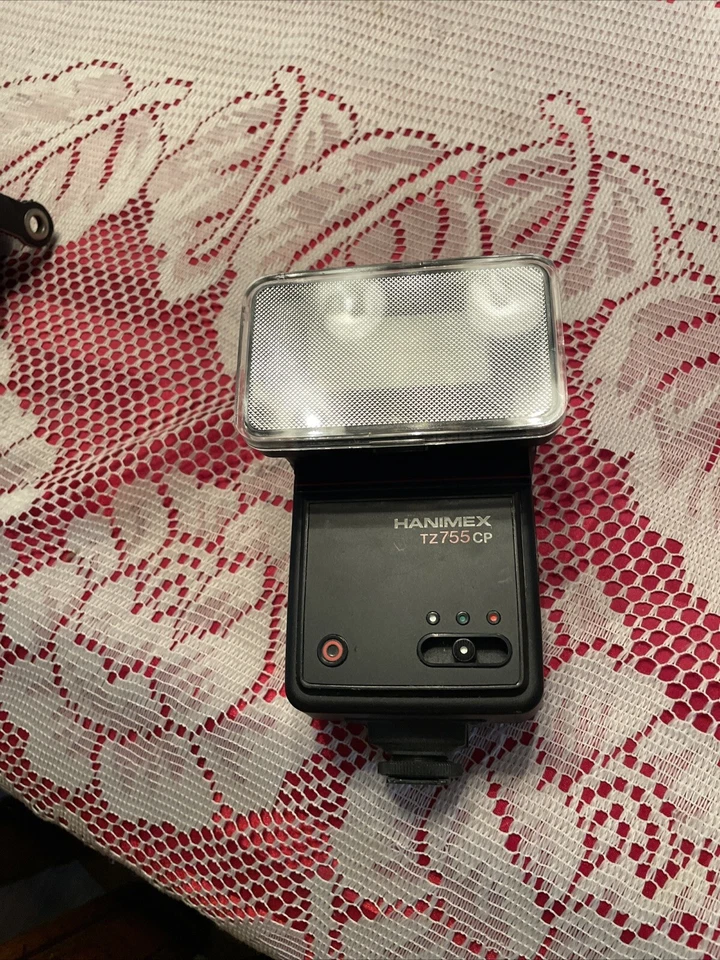 Flash de montaje en zapata Hanimex TZ 755 CP para cámaras Olympus (inclinación, giro, zoom) Foto 2 de 4