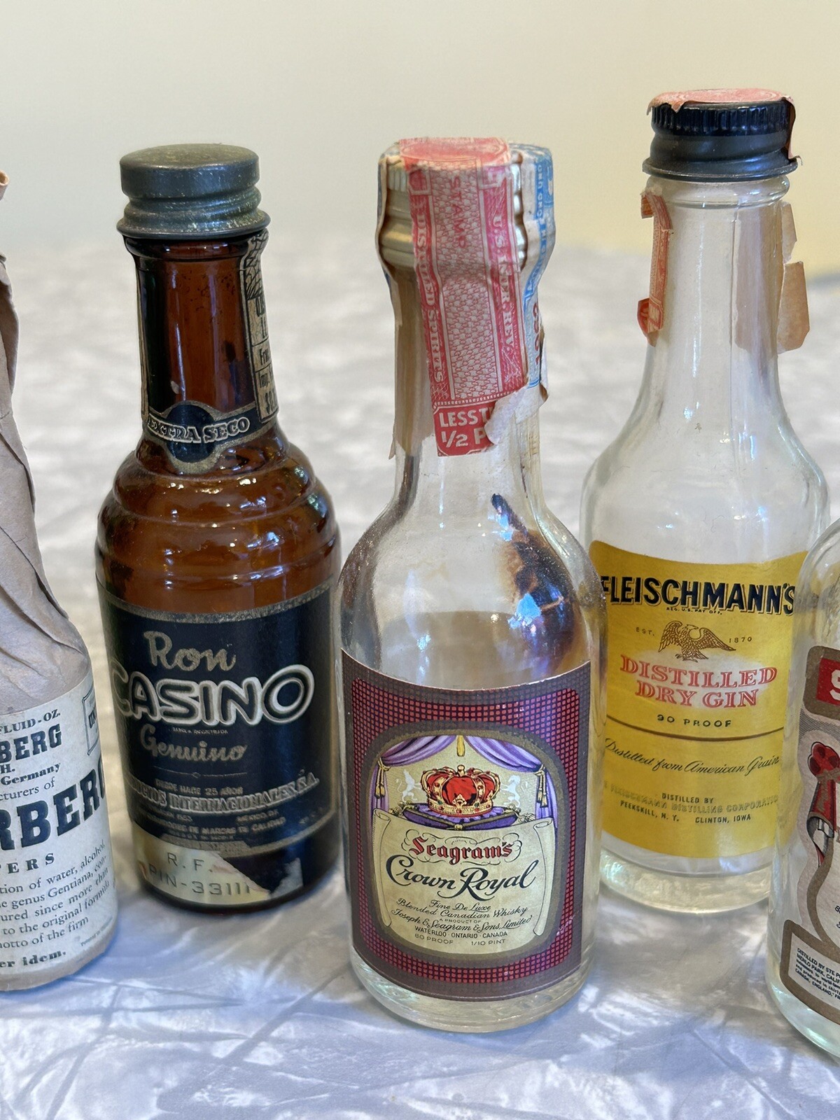 Lot of 13 Vintage Miniature Airline Liquor Bottles Colored Embossed