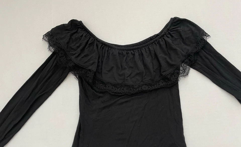 Top Hollister manga larga con volantes extra pequeño negro para mujer 336278160 904190744 Foto 2 de 3