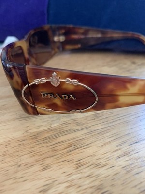Prada Sunglasses Tortoise Shell Frame With Gold Prada Emblem  display picture 3