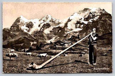 Vintage Switzerland Postcard Alphorn Player Berner Oberland Eiger Monch Jungfrau