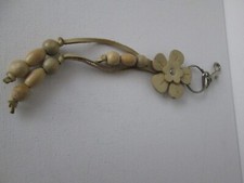 TAN FLOWER LEATHER TASSEL KEYCHAIN PURSE CLIP