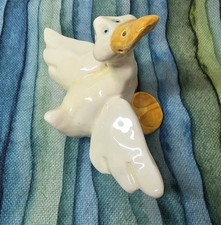 Ceramic Duck Figurine White Whimsical 5" Tall Wingspan 6" Blue Eyes 1999