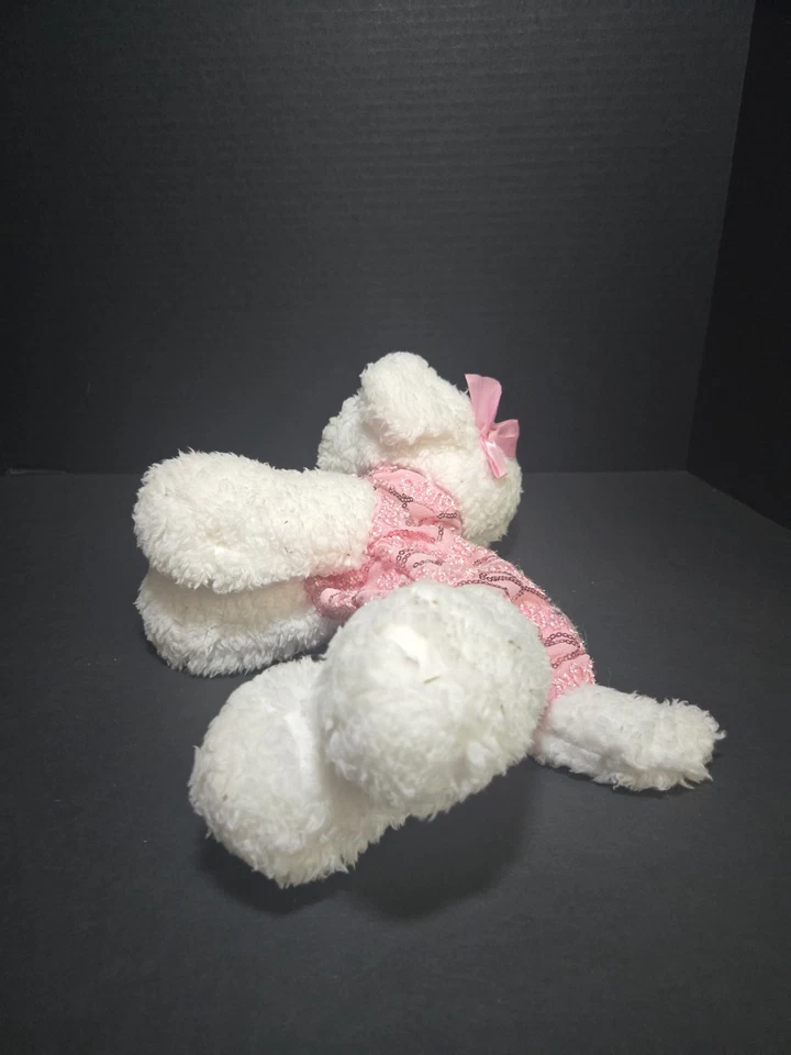 Perro blanco de felpa suave con lazo rosa y atuendo, estuche para lápices con cremallera Foto 4 de 4