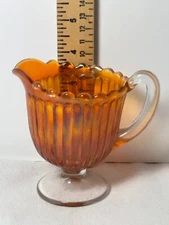 Carnival orange glass unique ribbed cream clear stem and handle vintage