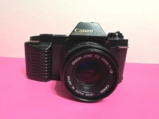 Canon T50 35mm SLR Film Camera w/ Canon FD 50mm 1:18 Lens - Tested Working