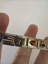 Zoppini+ Bracciale Charm Acciaio Elasticizzato 20 Charms Bandiera Viaggio Chiave Stella Marina...