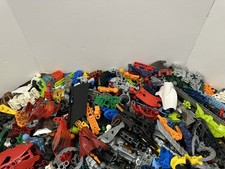 1kg job lot bundle of Bionicle/ Hero factory Parts including Masks  bag 9