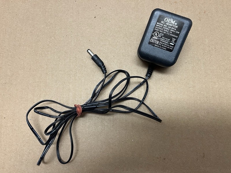 OEM AC Adapter Model AA/091AOutput 9 Vac, 60hz, 12 Watt Input. Barrel Plug Input