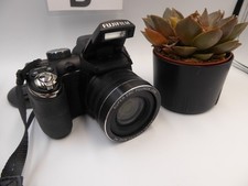 Fujifilm FinePix S4200 Digital Camera. black model tested  + memory SD Card.