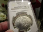 PRETTY RAINBOW TONED MORGAN DOLLAR  NGC  1884-O  MS-63  CRESSENT SHAPED TONING