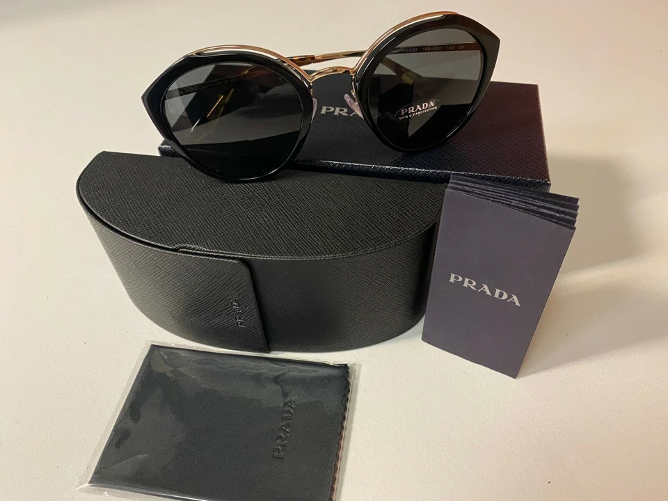 Gafas de sol para mujer Prada PR18US 1AB5S0 negras/doradas pálidas Foto 2 de 4