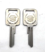 (1) Cadillac  "C"  vintage  OEM  Key blank with logo