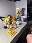 Pokemon 13 Piece Lot/ Plushys Funko Pops/Action Figures And Unopened Card Packs