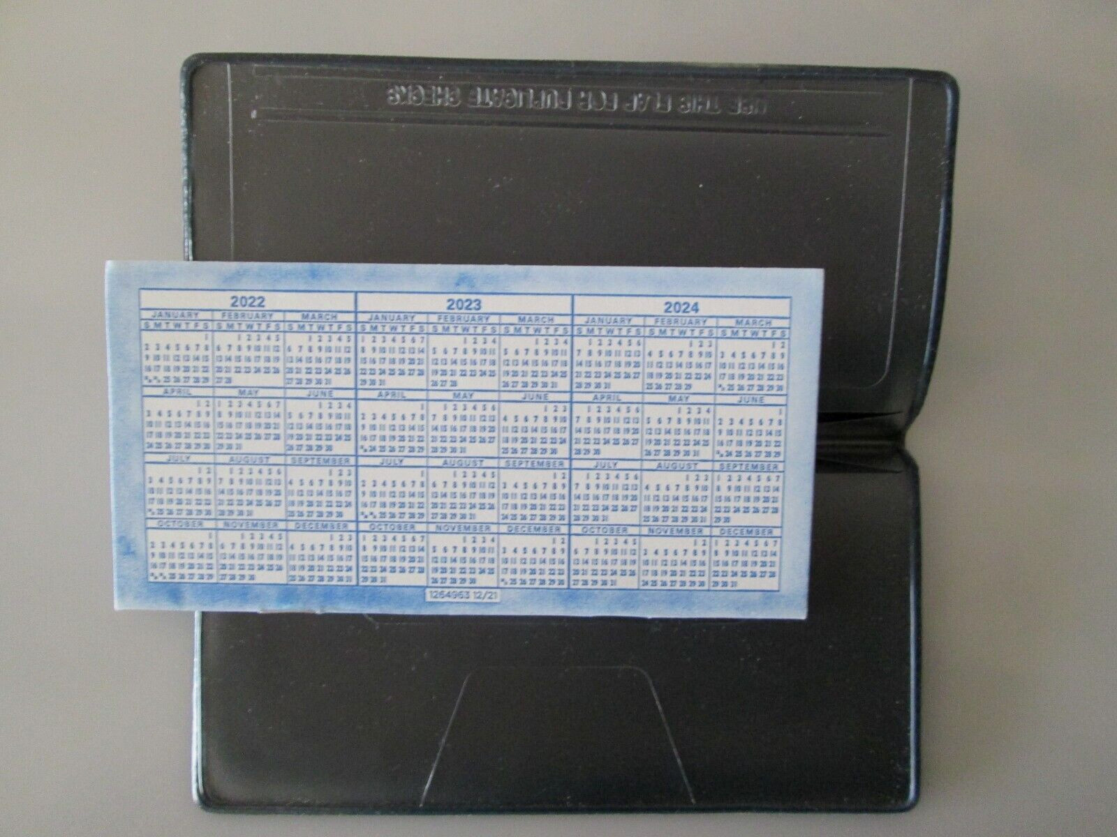 как выглядит Vinyl Checkbook Cover Dark Blue W/small Register Book -New фото