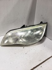 Used Left Headlight Assembly Fits 2004 Saturn Ion Cpe Quad 2 Dr Left Grade A