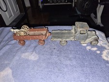 Vintage cast iron Arcade Stake truck and pull cart extra driver 