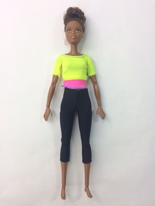 yellow top made to move barbie