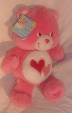 CARE BEARS LOVE-A-LOT MUSICAL TALKING BEAR HEAD MOVES NEW WITH TAG
