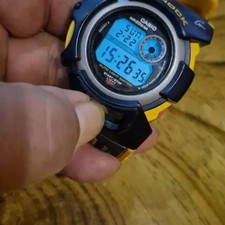 G-Shock DWX101 Watch Blue Yellow Combination Official