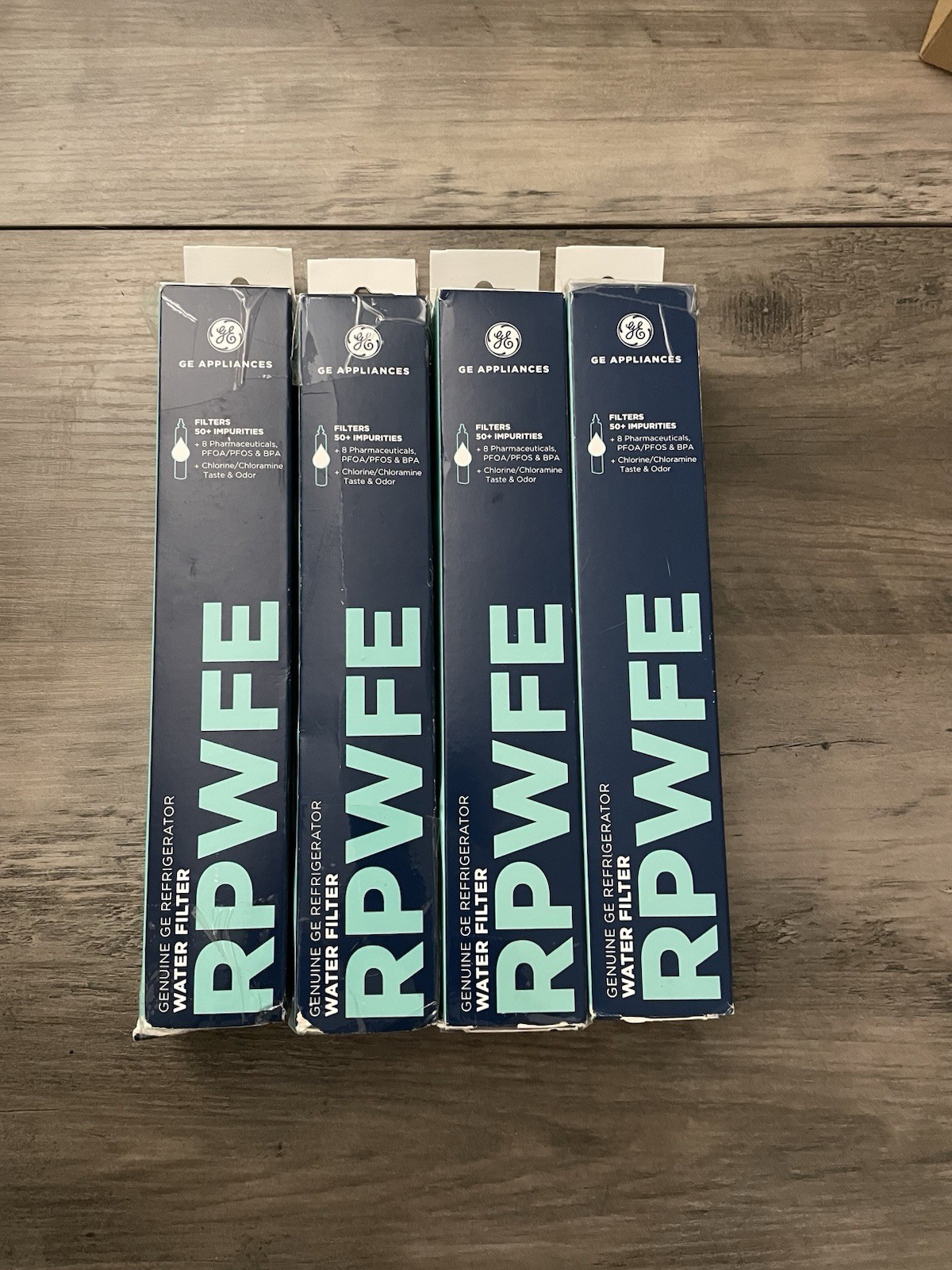 4 Genuine GE RPWFE Refrigerator Water Filter in 4 Pk Box wit