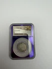 1909 Barber Quarter 25C NGC Genuine Purple Core TAT