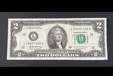 ERROR $2 DLL BILL - OVERINK ON SERIAL #: "4", FRB L12, 2017A, CIRC.
