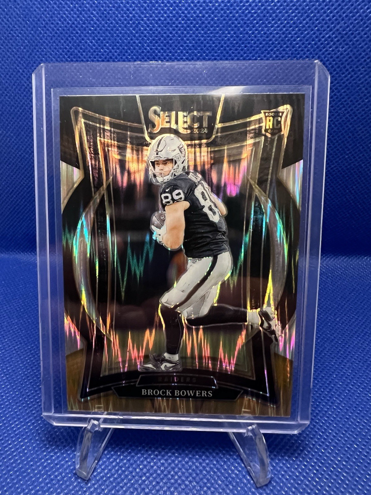 2024 Panini Select #31 Brock Bowers (RC) Concourse Black and Gold Shock Prizm