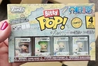 One Piece Monkey D. Luffy, Roronoa Zoa, Axe-Hand Morgan & Smoker Funko Bitty