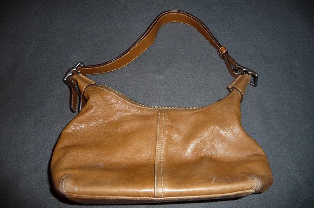 coach black and gold purse