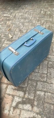 old blue suitcase