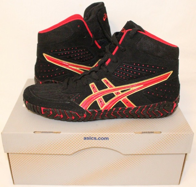 asics aggressor black and gold