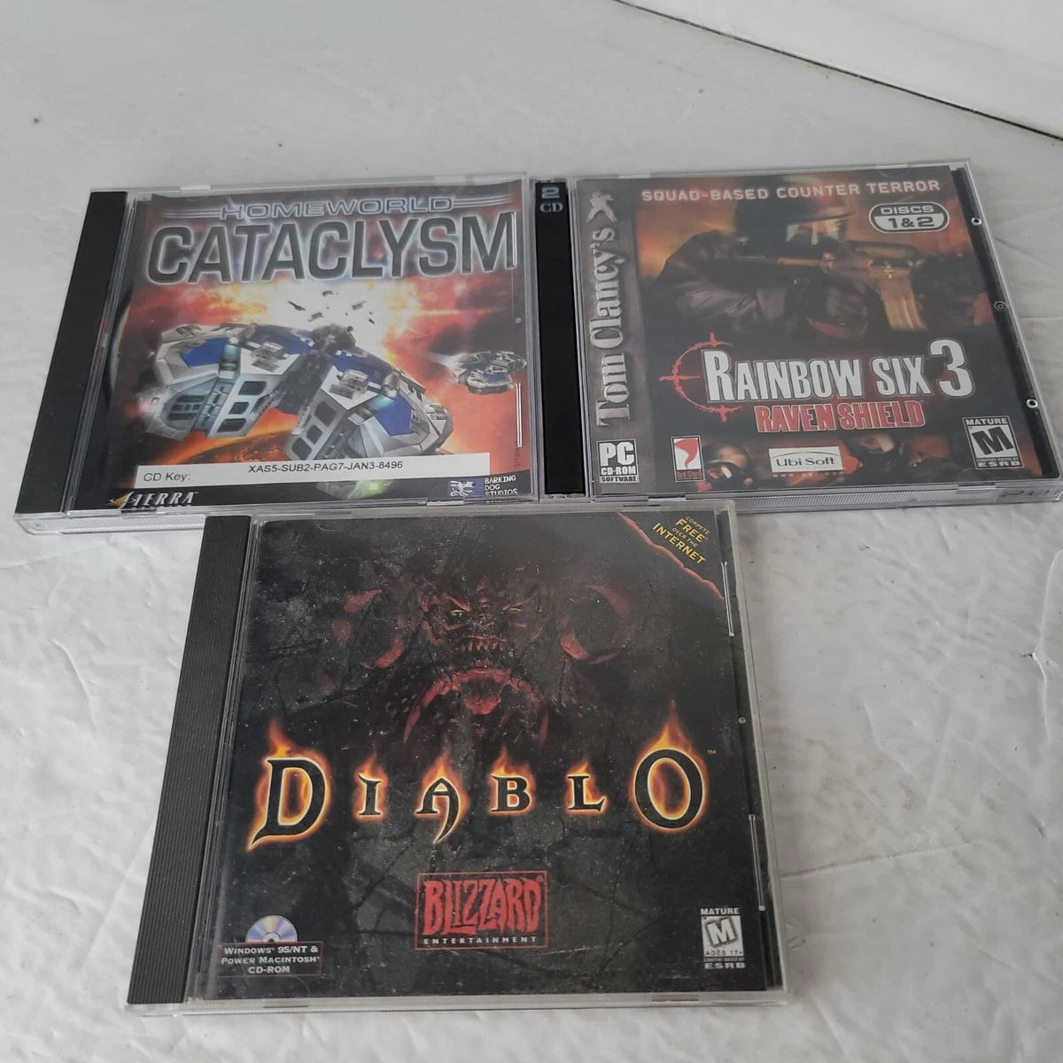 3 CD Rom Video Games Diablo Cataclysm Rainbow Six 3 Windows 95 And.