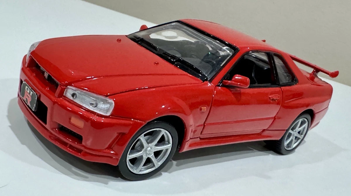 Литые модели автомобилей, грузовиков и фургонов MOTORMAX Nissan