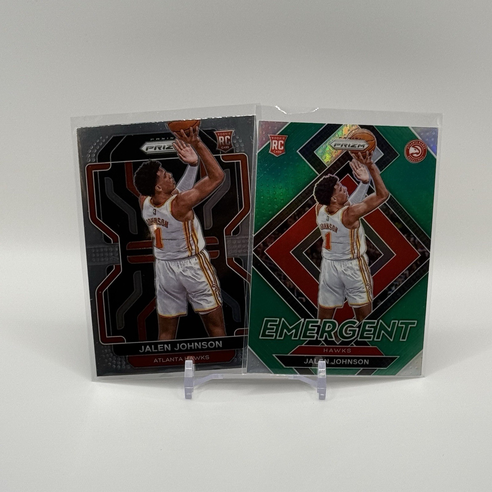 2021-22 Panini Prizm Jalen Johnson Rookie Emergent Green Prizm and Base RC Hawks