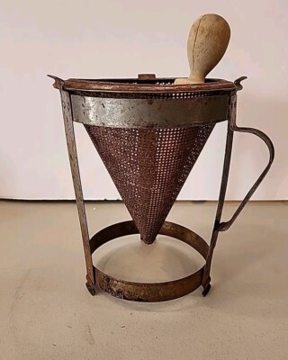 VINTAGE DEPRESSION ERA METAL CONE-SHAPE SIEVE & WOOD PESTLE TRIPOD COLANDER