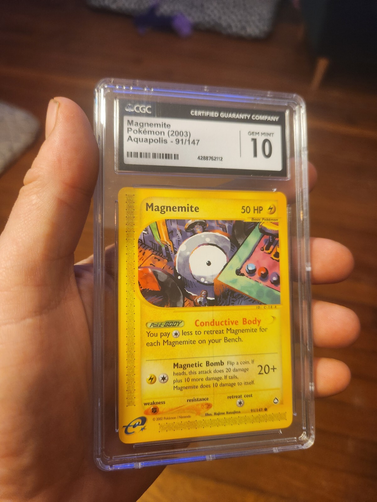 (POP 23) CGC 10 GEM MINT Pokémon Aquapolis Magnemite eReader 91/147 Card 2003