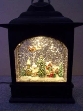 Raz Import Santa in Sleigh Over Church Town Bronze Christmas Water Lantern