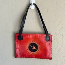 Leather hand made embossed red and black shoulder bag ant made in Peru