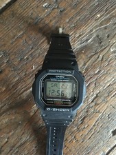 Casio DW-5600E G-Shock 45mm Black Rubber Case Black Rubber Strap Men's...