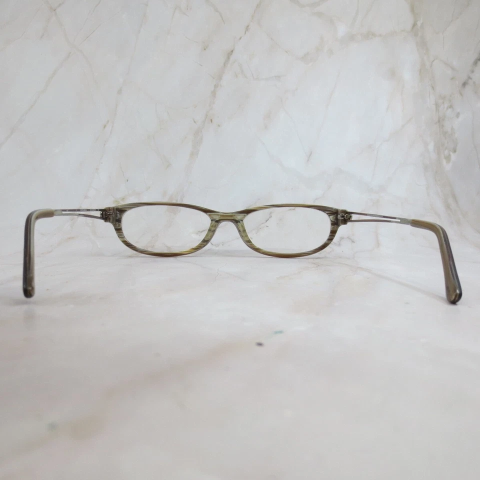 Marco de gafas Geoffrey Beene Brilliance para mujer de plástico marrón borde completo ovalado Foto 4 de 4