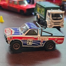 Auto World Datsun 1975 620 TRUK Xtraction HO Slot Car Red White Blue NEVER RAN