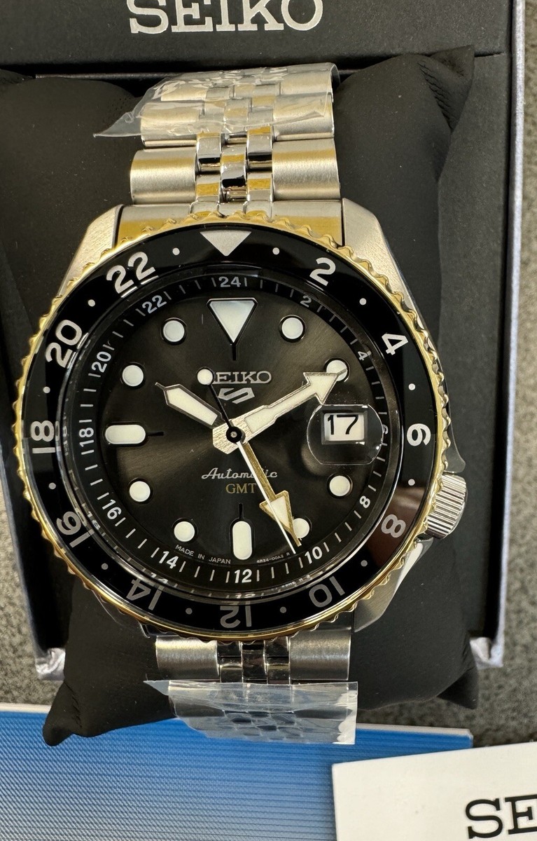 Seiko 5 Automatic GMT Steel Band Black Dial Gold Bezel Watch Seiko 5 Automatic GMT Steel Band Black Dial Gold Bezel Watch