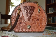 Hand tooled leather shoulder handbag