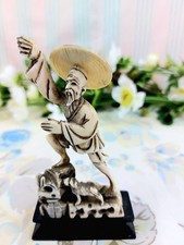 Statuette chinoise pêcheur avec son chien