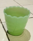A vintage jadeite green milk glass vase Planter with ruffled rim