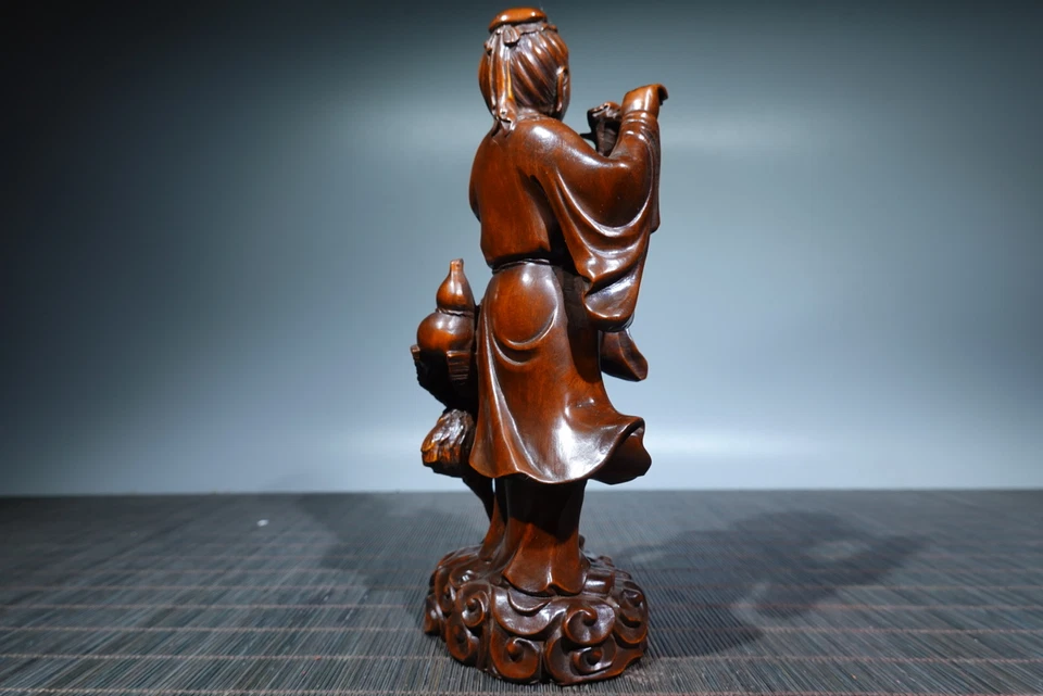 Estatua de pie de niño grúa blanca tallada en madera de caja china de 6,9" Foto 3 de 4