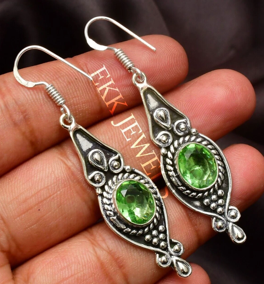 Orecchini A Perno A Stella In Cristallo Verde In Argento Sterling